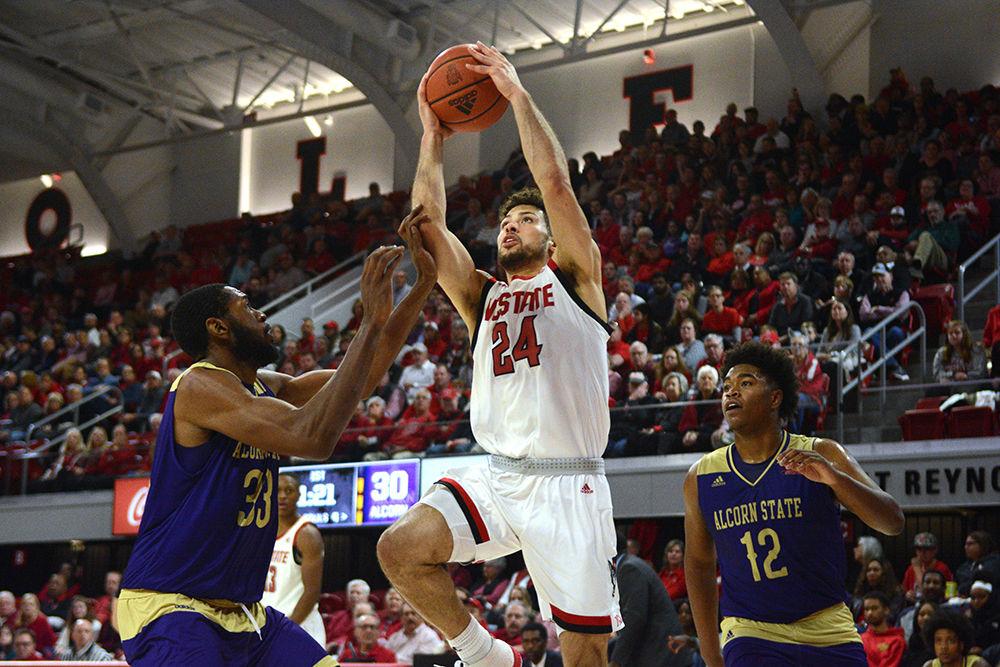 Senior guard Devon Daniels goes up for a shot against Alcorn State at Reynolds Coliseum on Tuesday, Nov. 19, 2019. The Wolfpack beat the Braves 87-64.