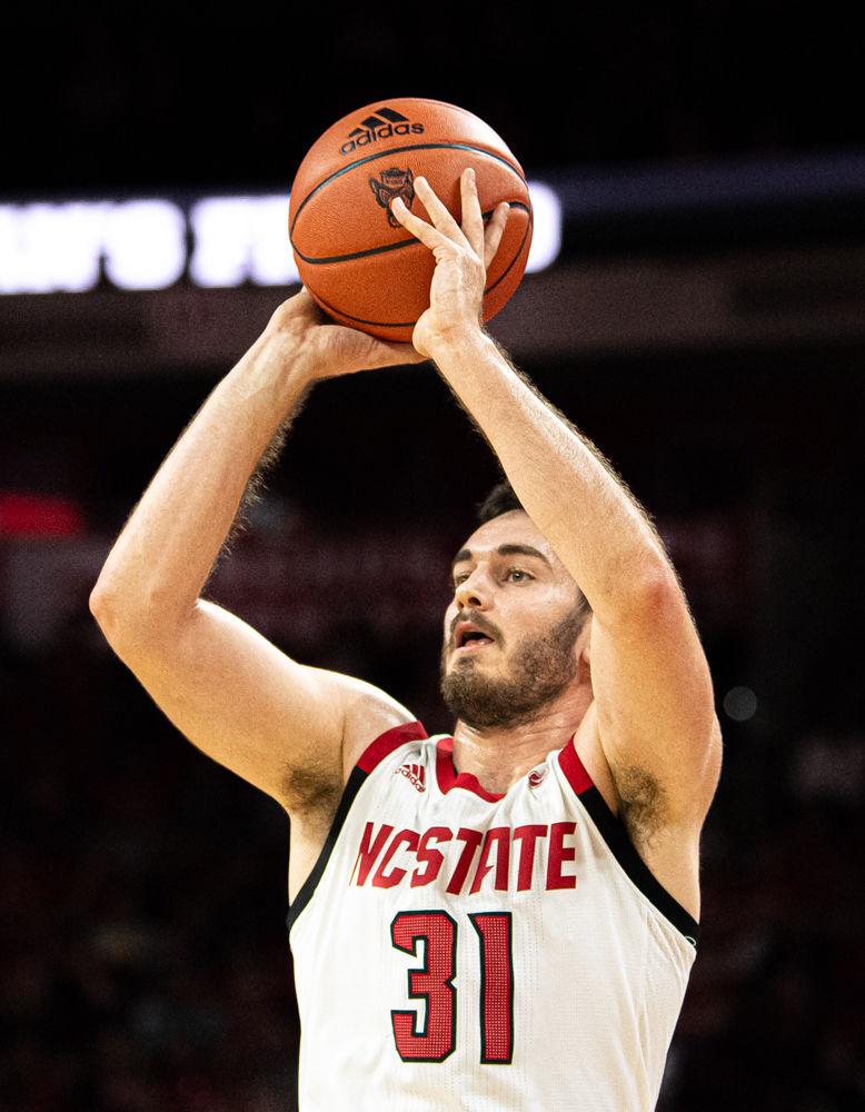Graduate forward Pat Andree shoots against Appalachian State on Sunday, Dec. 29, 2019 at PNC Arena. The Wolfpack won 72-60.