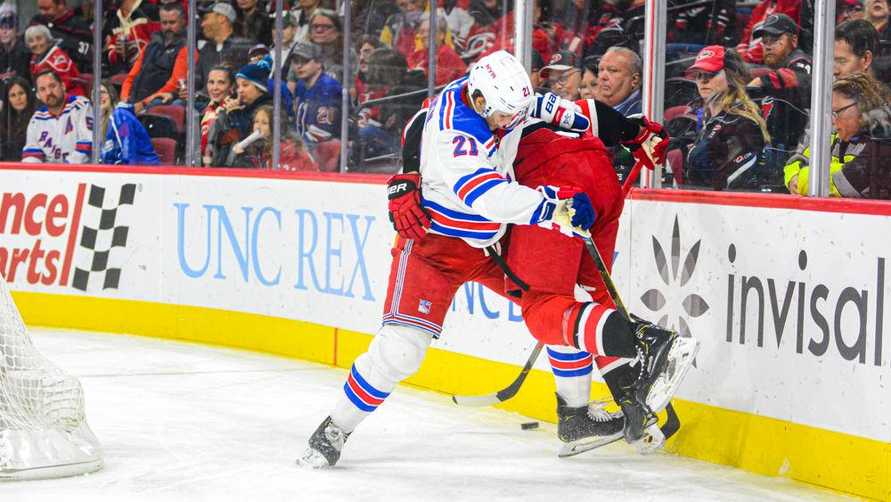 New York Rangers center Brett Howden pressures Hurricanes right wing Nino Niederreiter on Thursday, Nov. 7 at PNC Arena. The Hurricanes lost 4-2.