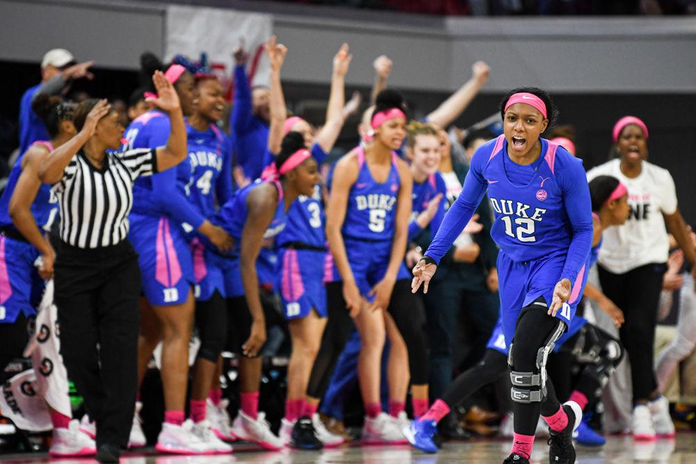 The Duke Blue Devil bench celebrates with redshirt sophomore guard Mikayla Boykin after she scores a three pointer on Monday, Feb. 24, 2020 in Reynolds Coliseum during the 15th annual Play 4 Kay game. NC State lost to Duke 70-65.