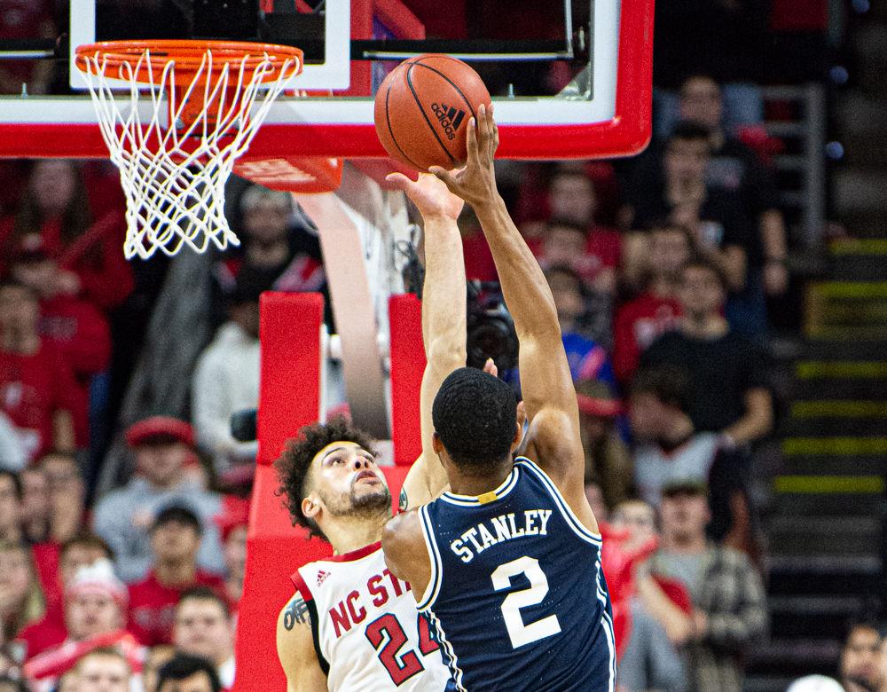 Redshirt junior guard Devon Daniels contests a shot by Duke guard Cassius Stanley on Wednesday, Feb. 19, 2020 at PNC Arena. Daniels recorded 25 points and nine rebounds as the Wolfpack upset No. 6 Duke 88-66.