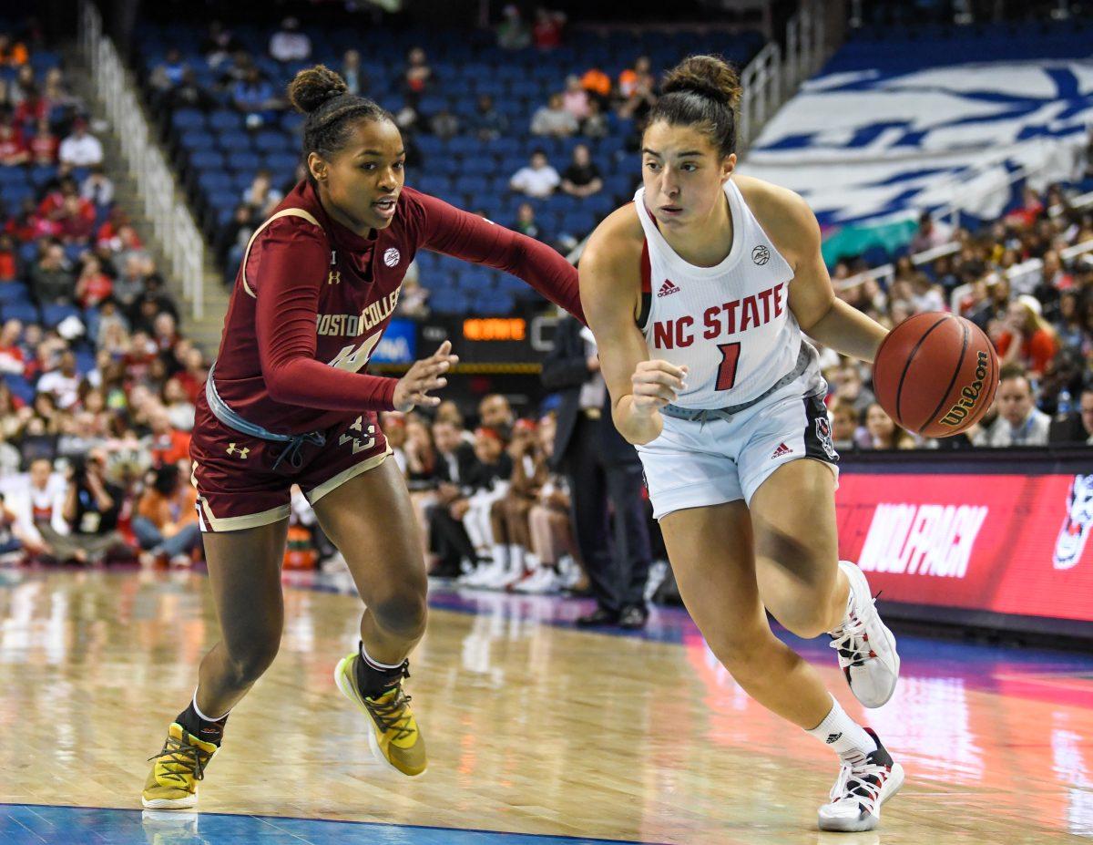 Senior guard Aislinn Konig drives down the court during the semifinal game of the 2020 ACC Women's Tournament versus the Boston College Eagles on Saturday, March 7, 2020 in the Greensboro Coliseum. Konig scored 16 points against Boston College. The Wolfpack beat the Eagles 82-75 to advance to the championship game against Florida State.