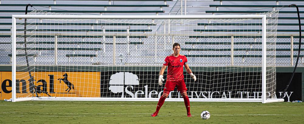 North Carolina FC goalkeeper Alex Tambakis controls the ball during the game against Memphis 901 FC on Thursday, Sept. 10 at WakeMed Soccer Park. Tambakis conceded three goals and made one save as NCFC lost 3-2.