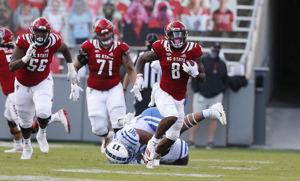 N.C. State running back Ricky Person Jr. (8) gains yards during the first half of N.C. State&#8217;s game against Duke at Carter-Finley Stadium in Raleigh, N.C., Saturday, Oct. 17, 2020.