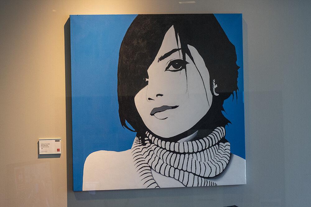 An acrylic painting titled "Blue Narcotic" by Anthony Casaletto sits on a wall in Talley Student Union on Tuesday, Feb. 2, 2020.