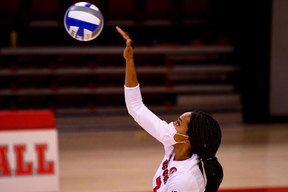 Junior middle blocker Pam Chukwujekwu serves against Duke on Friday, Feb. 26, 2021 at Reynolds Coliseum. The Wolfpack won in five sets.