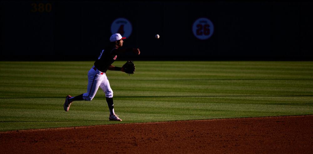 Freshman infielder Jose Torres throws to first base against No. 16 Florida State on Friday, May 21, 2021 at Doak Field. The Wolfpack won 6-4.