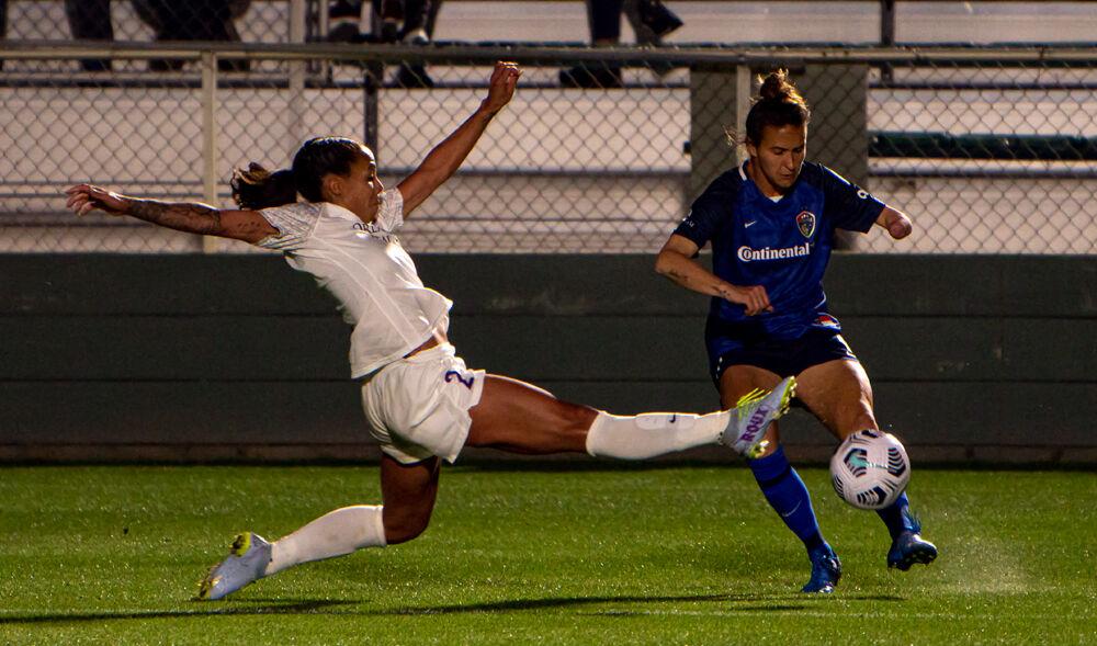 North Carolina Courage defender Carson Pickett crosses the ball against the Orlando Pride on Saturday, May 1, 2021 at WakeMed Soccer Park. The match ended 0-0.
