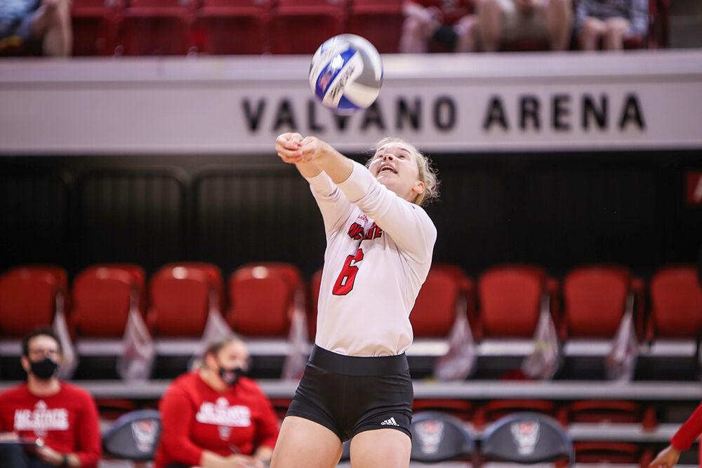 NC State junior Hannah Wander (6) passes the ball during the Wolfpack's exhibition game against the Coastal Carolina Chanticleers in Reynolds Coliseum on Saturday, August 21, 2021. Coastal Carolina defeated the Wolfpack 3-1 in the exhibition match, their first match of the season.