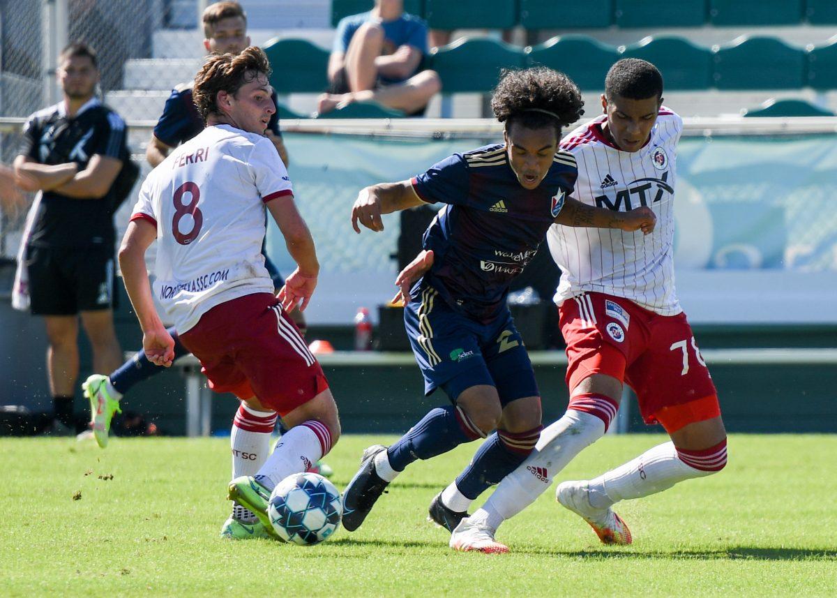 North Carolina FC forward Aziel Jackson battles with the North Texas SC defense to keep possesion of the ball on Sunday, Sep. 26, 2021 in Sahlen's Stadium at WakeMed Soccer Park. NCFC lost to North Texas SC 1-0.
