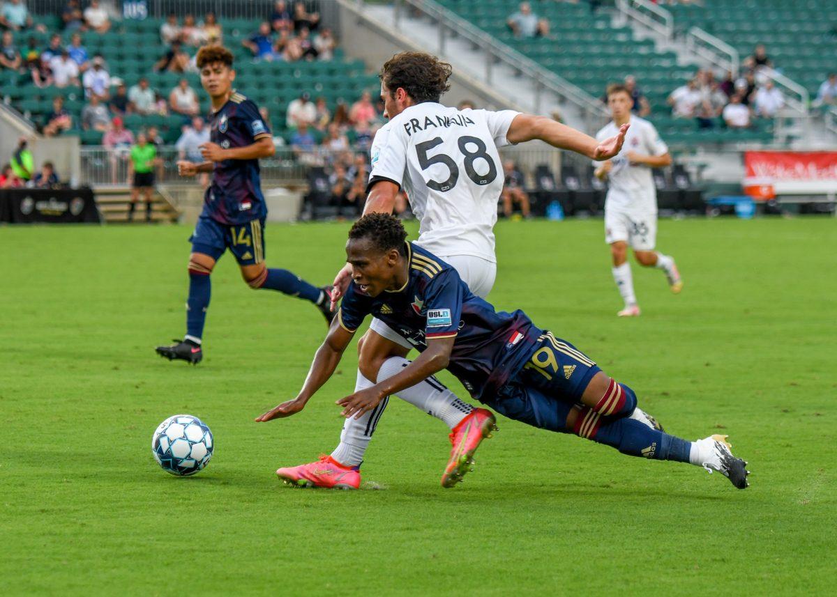 NCFC midfielder Jay Tee Kamara falls after making a run to the goal during the game versus Toronto FC II on Sunday, July 18, 2021 in Sahlen's Stadium at WakeMed Soccer Park. NCFC lost to Toronto FC II 4-2.