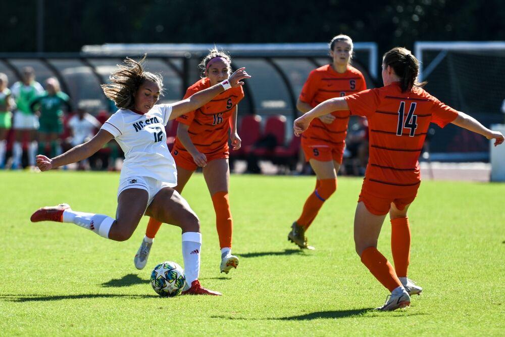 Sophomore midfielder Jaiden Thomas shoots the ball towards the goal during the game versus the Syracuse Orange on Sunday, Oct. 24, 2021 at Dail Soccer Field.&#160; The Wolfpack beat Syracuse 3-0 in the Wolfpack's last home game of the season.&#160;