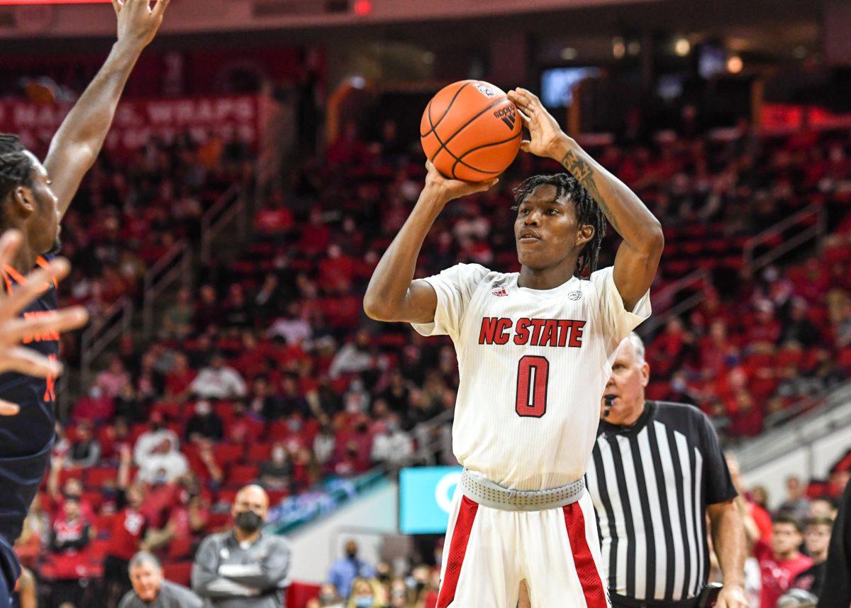 Freshman guard Terquavion Smith puts up a quick shot during the game versus the Bucknell Bisons on Tuesday, Nov. 9, 2021 in PNC Arena. Smith scored 20 points against the Bisons. NC State&#160;beat Bucknell 88-70.