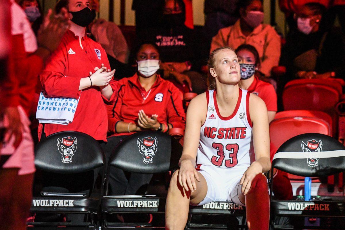 Senior center Elissa Cunane waits for her name to be called during the starting lineups before the game versus the UNC Tar Heels on Thursday, Jan. 6, 2021 in Reynolds Coliseum. Cunane scored 19 points and had 13 rebounds against UNC. The Wolfpack beat the Tar Heels 72-45.