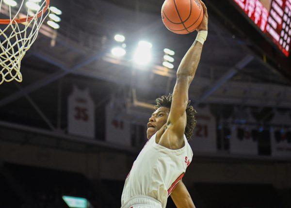 Freshman guard Terquavion Smith goes up for a dunk during the game versus the Boston College Eagles on Wednesday, Feb. 23, 2022 in PNC Arena. Smith led the Wolfpack with 21 points an had 7 rebounds against Boston College. The Wolfpack lost to the Eagles 69-61. 