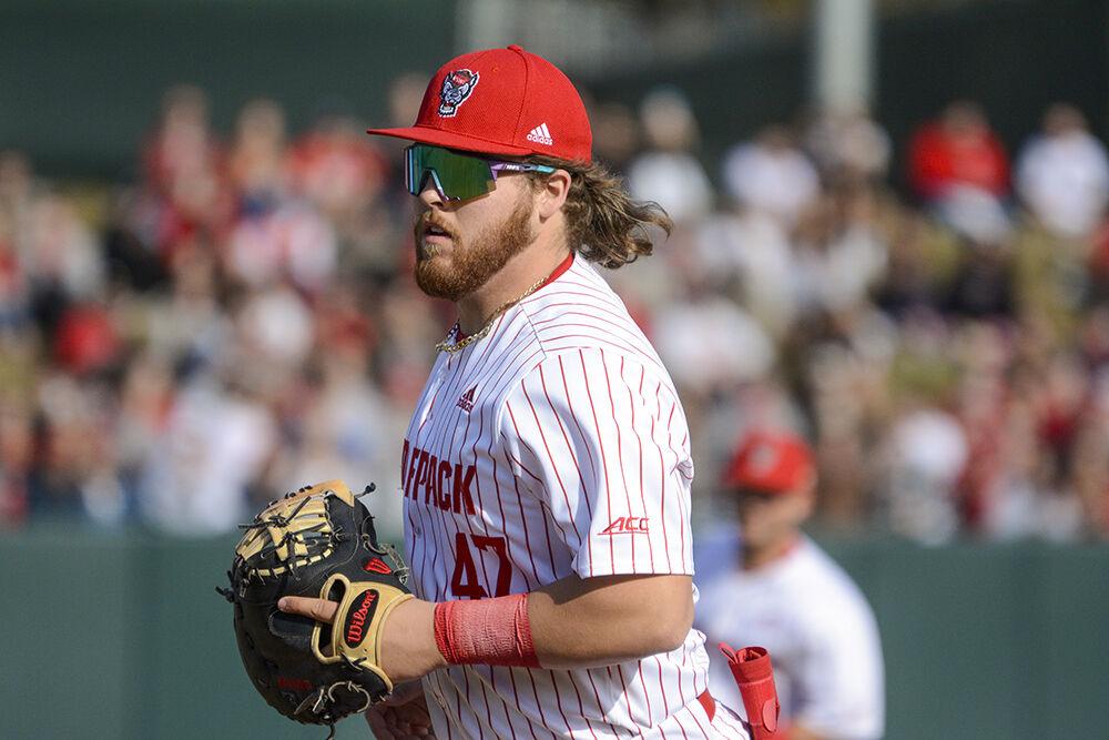 Freshman infielder Tommy White runs off to change fields during the Wolfpack's home opener versus the Evansville Purple Aces in Doak Field at Dail Park on Friday Feb. 18, 2022. White hit three home runs for the Pack.&#160;The Pack beat the Purple Aces 24-6.