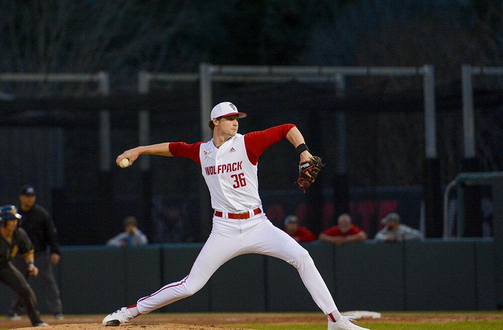 Sophomore pitcher Garrett Payne pitches during the game against NC A&amp;T on Tuesday, March 22, 2022 in Doak Field at Dail Park. Payne had one strikeout with NC State beating NC A&amp;T 5-3.