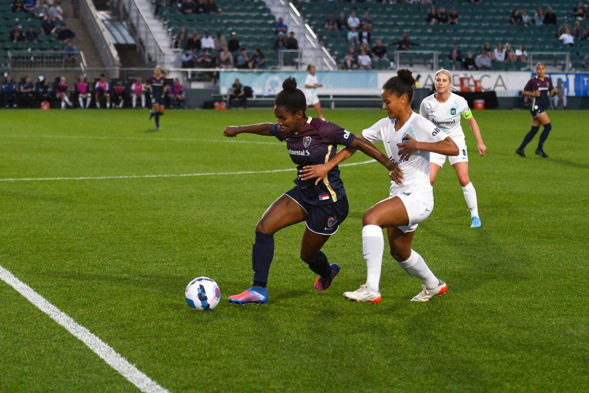 NC Courage midfielder Brianna Pinto moves the ball down the field during the game against the NY/NJ Gotham on Saturday, March 19, 2022 in Sahlen's Stadium at WakeMed Soccer Park. Pinto scored one of two goals made during the game and was assisted by defender Carson Pickett. The Courage won the game with a final score of 2-0.