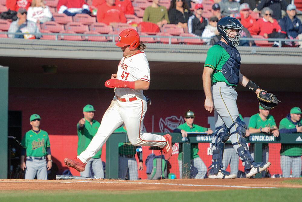 Freshman infielder Tommy White runs over home plate during the Wolfpack's home baseball game against the Notre Dame Fighting Irish at Doak Field on March 11, 2022. The Wolfpack lost the opening game of the home series 8-4 in 12 innings.