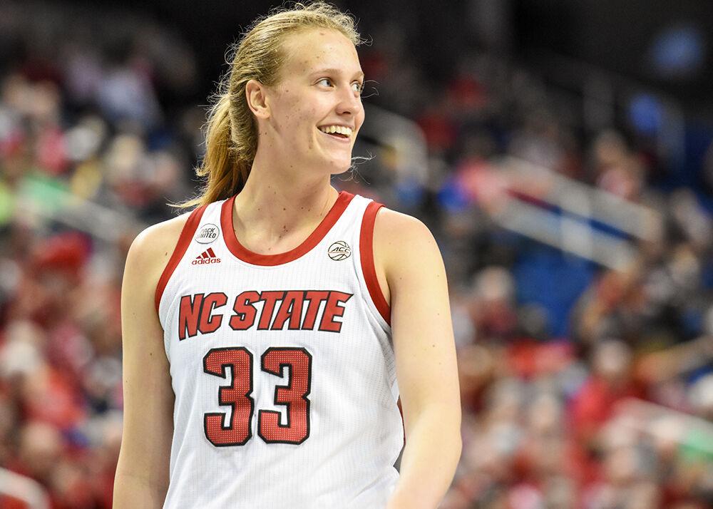 Senior center Elissa Cunane smiles during the semi-final game of the Women's ACC Tournament versus the Virginia Tech Hokies on Saturday, March 5, 2022 in the Greensboro Coliseum. Cunane scored 20 points and had 13 rebounds against Virginia Tech. The Wolfpack beat the Hokies 70-55.