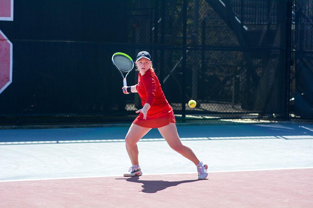 Sophomore Sophie Abrams prepares to forehand the ball during the match against UNC-Chapel Hill on Sunday, April 3, 2022 at Dail Outdoor Tennis Stadium. Abrams won her singles match 2-1. The Wolfpack lost to the Tar Heels 4-3.