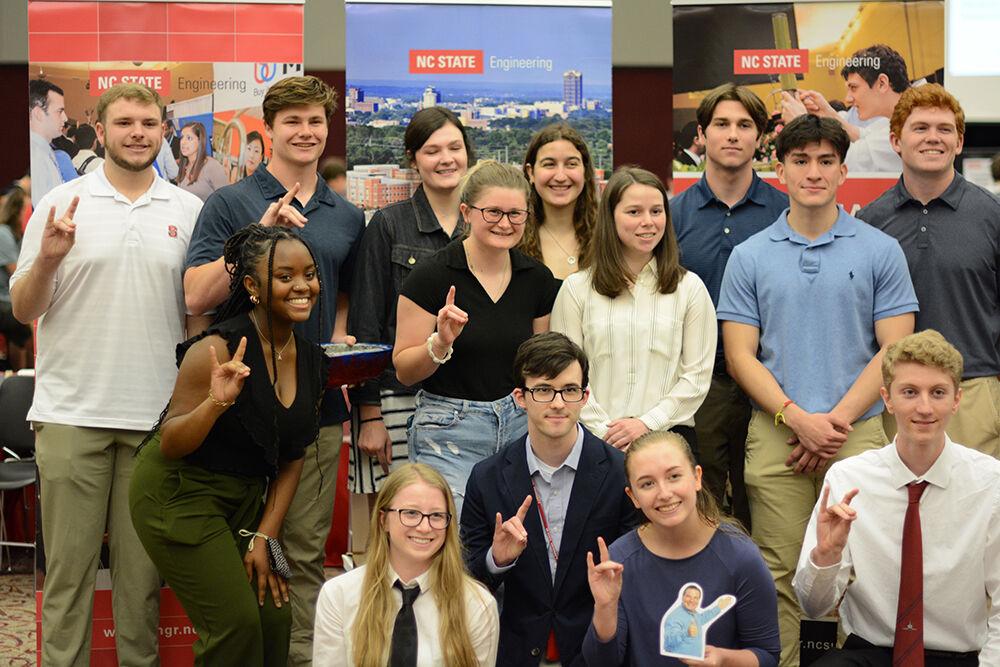 The concrete canoe project winners smile for photos during awards at the 22nd Annual First-Year Engineering Design Day on Friday, April 22, 2022 at the McKimmon Center.