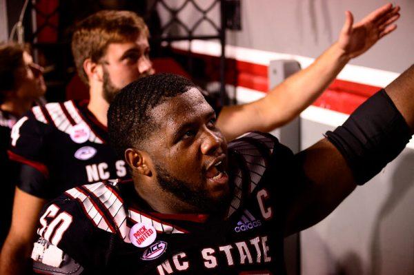 Redshirt junior center Grant Gibson greets fans after the win over Louisiana Tech on Saturday, Oct. 2, 2021 at Carter-Finley Stadium. The Wolfpack won 34-27.