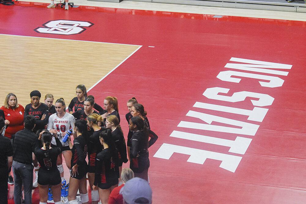 The North Carolina State University vollyball team prepares to play Western Carolina University. The Wolfpack lost 3-1 against the Catamounts on Friday, Sept. 9, 2022 in Reynolds Colliseum.