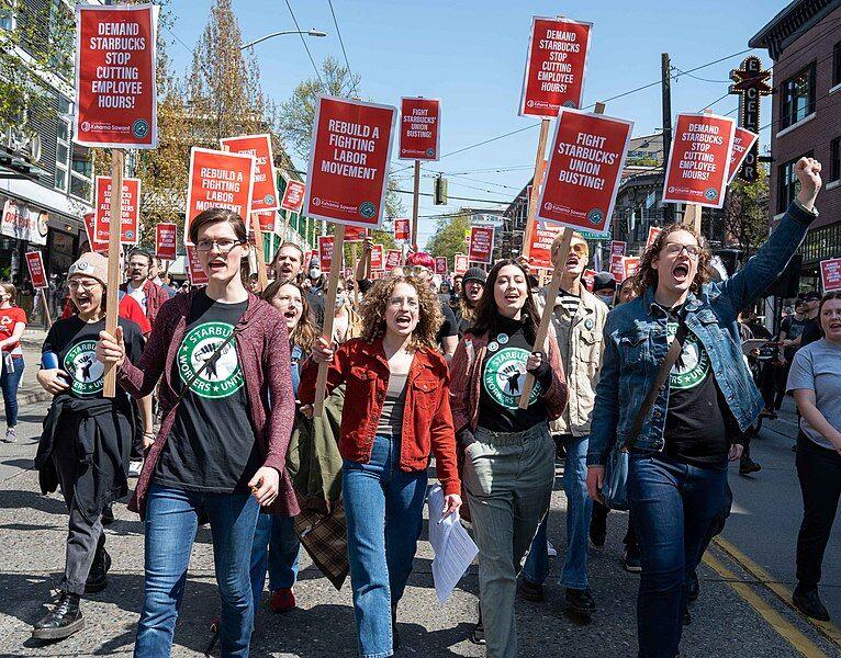 Starbucks workers rally and march in Seattle WA
Via Wikimedia Commons
Elliot Stoller