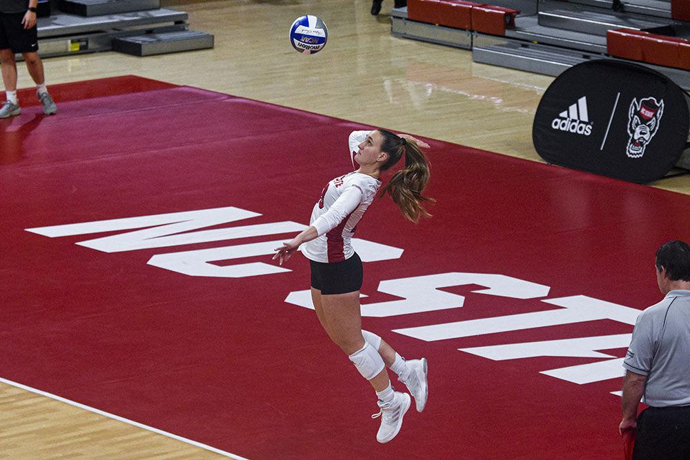 Graduate libero Pricilla Hernandez serves the ball during the game against Western Carolina University on Sept. 9, 2022 in Reynolds Colliseum. The Wolfpack lost 3-0 against the Catamounts.