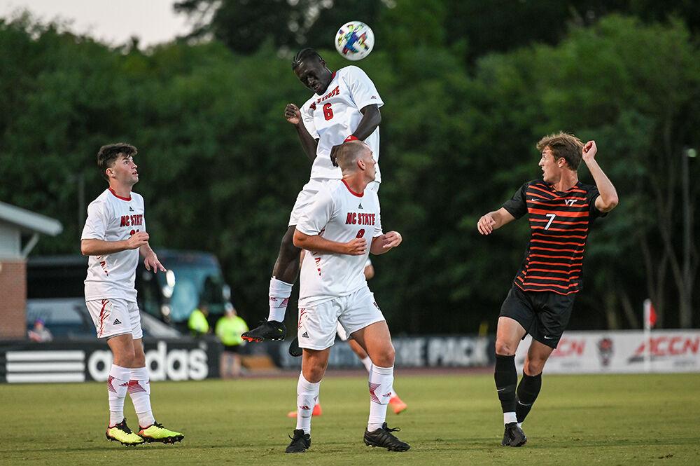 Senior defender Kendall Edwards jumps to head the ball during the match against Virginia Tech on Friday, Sept. 23, 2022 at Dail Soccer Field. NC State beat Virginia Tech 1-0.