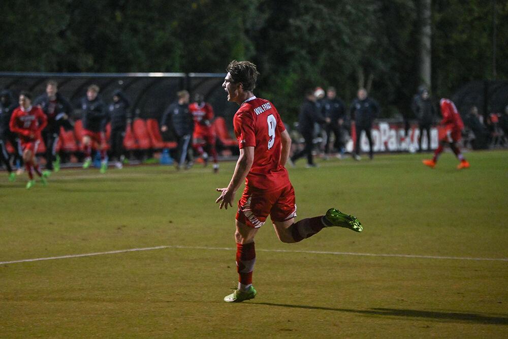 Sophomore forward Luke Hille celebrates his goal during the Wolfpack's home soccer match against the William &amp; Mary Tribe on Tuesday, Oct. 18, 2022 at Dail Soccer Field. The Wolfpack beat the Tribe 2-1.
