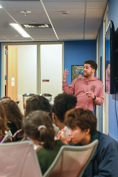 Gavin Bell, Assistant Director of Multicultural Student Affairs, talks to students at the Native American Heritage Month Chat n Chew discussion on Wednesday, Now. 9, 2022 in Talley Student Union. The Chat n Chew, organized by the Multicultural Student Affairs, provided attendees with dinner and an opportunity to discuss some of the issues regarding Native Americans on campus and beyond.