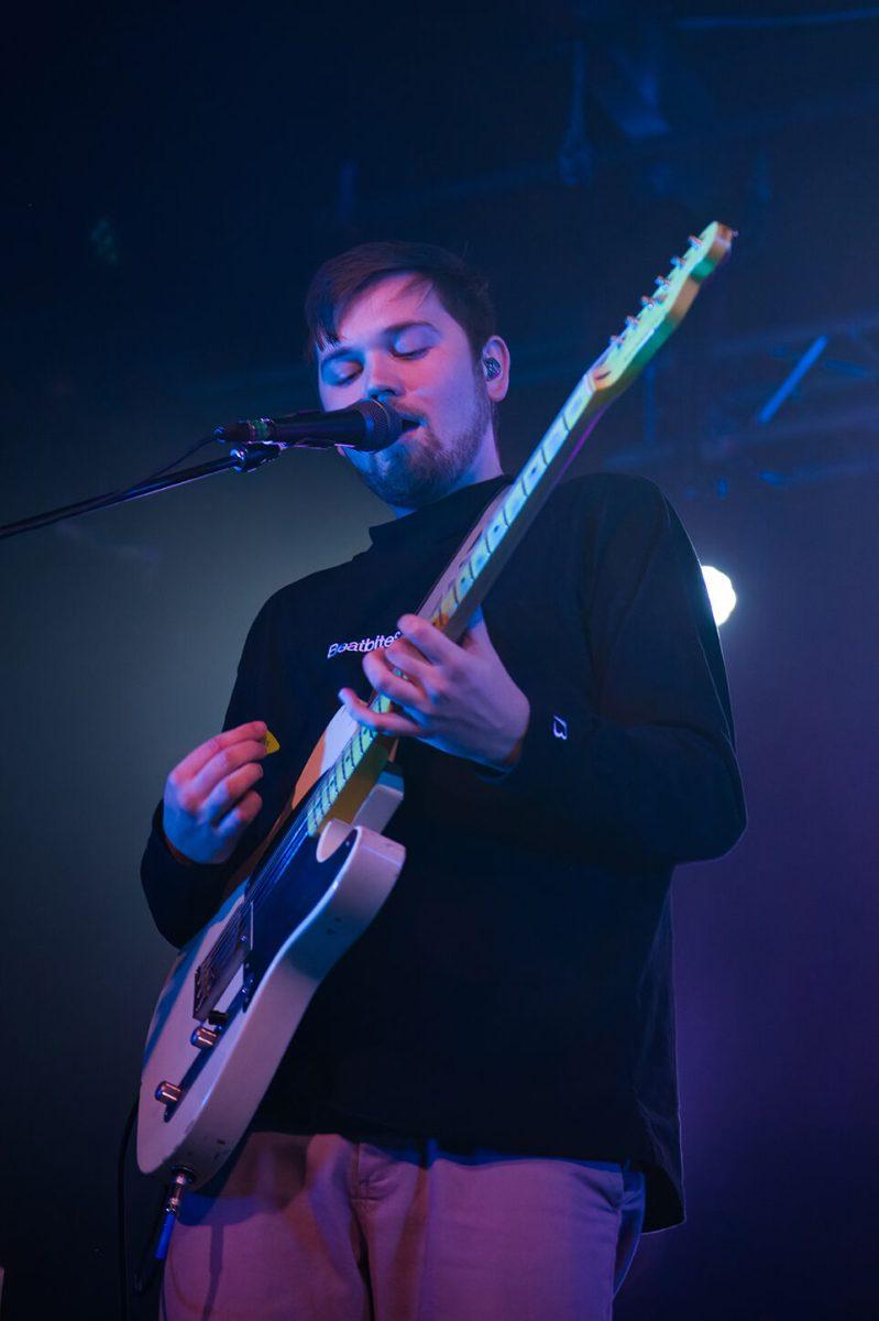 Ross Monteith of The Happy Fits sings and plays guitar during their concert at Cats Cradle on Tuesday Dec. 13, 2022. 