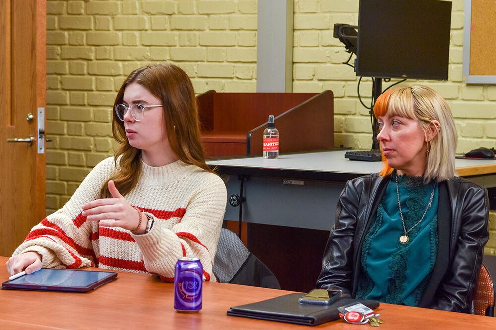 First-year assistant director Emma Fornes (left), studying management, answers questions made during the spring musical production meeting in Frank Thompson Hall on Tuesday, Jan. 17, 2023. The NC State spring musical is Urinetown and is set to perform at the end of February. Pictured right is director Danica Jackson.