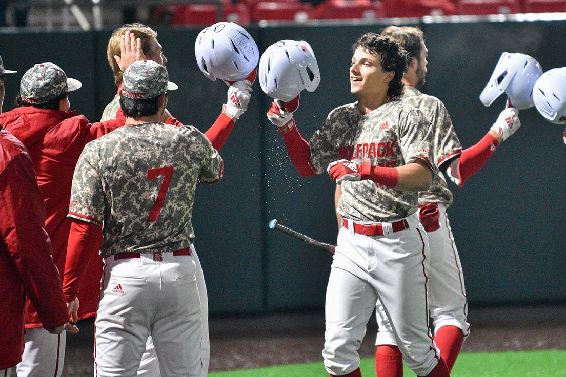 Junior outfielder Carter Trice celebrates a home run against Belmont at Doak Field at Dail Park on Saturday, Feb. 25, 2023. Trice had one home run and one hit in the game. NC State beat Belmont 7-0 to win the series.