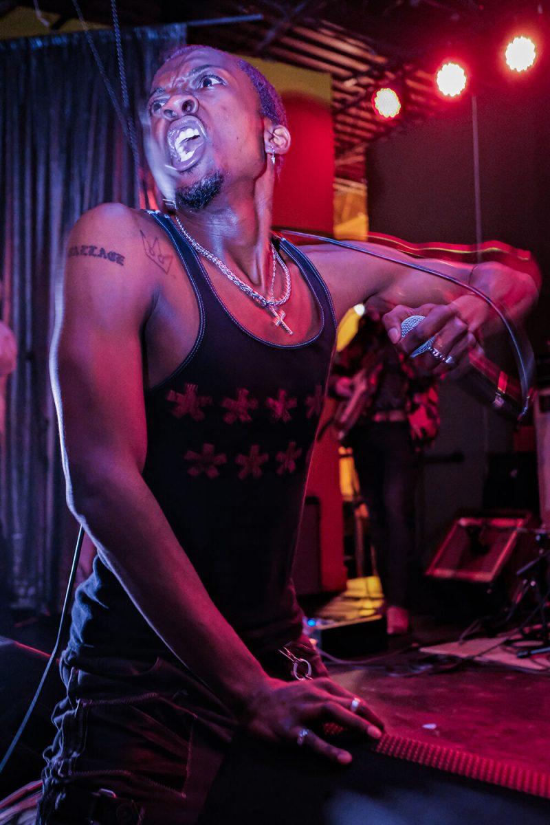 Austin Royale, a hip-hop artist rom Durham, performs at the WKNC Double Barrel Benefit on Friday, Feb. 3, 2023. The benefit served as a fundraiser for WKNC, a student-run radio from NC State University.
