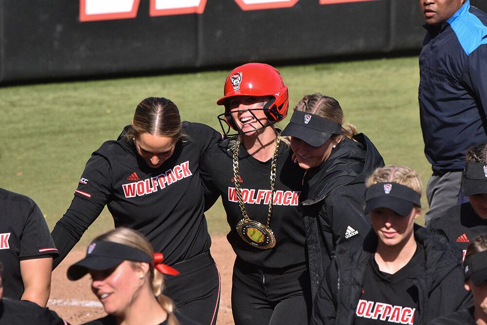 Junior infielder Haley Haislip (center) celebrates a home run with her team during the game against Boston College at Dail Softball Stadium on Saturday, March 18, 2023. Haislip scored two runs during the game. NC State won 8-4.
