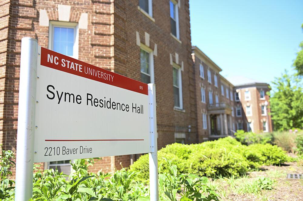 Syme Residence Hall sits on Baver Drive on Tuesday, April 18, 2023. Syme is one of the three buildings that make up the Triad. The other two buildings are Gold and Welch.