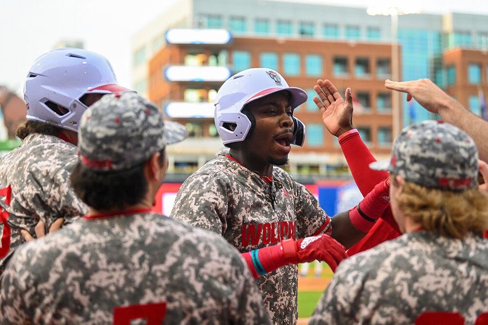 Junior infielder LuJames Groover celebrates with his teammates after hitting a home run during the ACC Tournament game against Duke at Durham Bulls Athletic Park on Tuesday, May 23, 2023. Groover had two hits and three RBIs for the Wolfpack. NC State beat Duke 8-7.