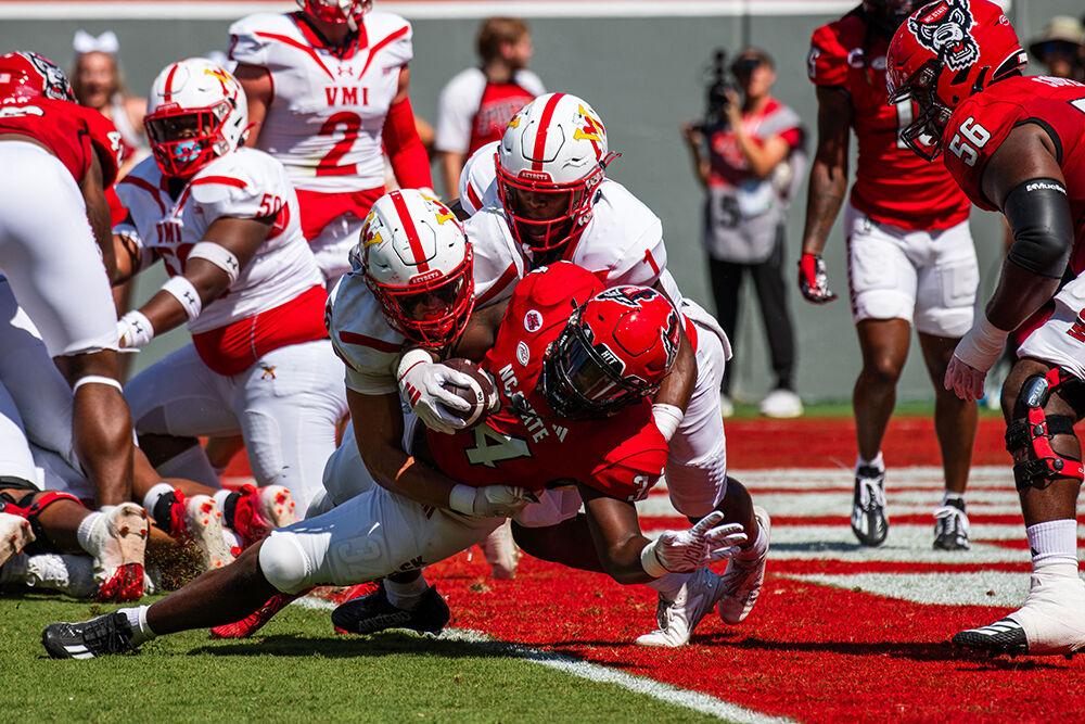 Redshirt junior running back Delbert Mimms reaches for the end zone to score against VMI during the game at Carter-Finley Stadium on Sept. 16, 2023. Mimms scored two touchdowns and had 35 rushing yards during the game. NC State beat VMI 45-7.