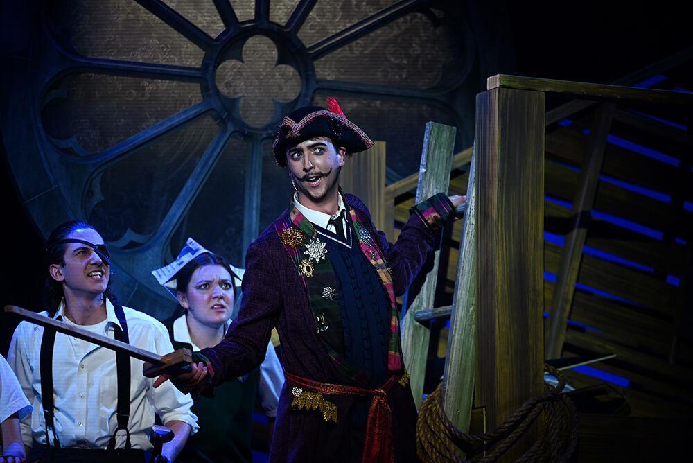 Jackson Griffin, a fourth-year studying history, as Black Stache acts to swing a sword during the dress rehearsal for NC State University Theatre's performance of "Peter and the Starcatcher" at Titmus Theatre on Wednesday, Oct. 18., 2023. "Peter and the Starcatcher" is a whimsical and imaginative prequel to Peter Pan, exploring the adventures that lead Peter to Neverland.