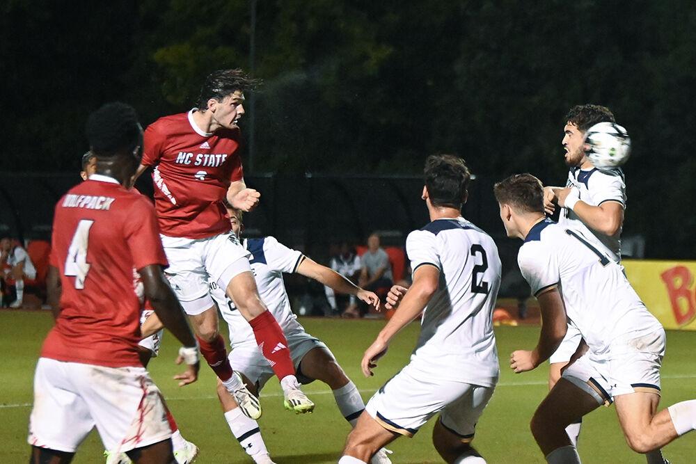 Junior forward Luke Hille heads the ball into the back of the net for a Wolfpack goal during the home game against the Notre Dame Fighting Irish at Dail Soccer Field on Sunday, Oct. 1, 2023. The Irish beat the Wolfpack 3-1.