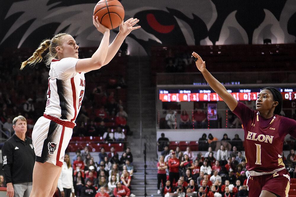 Freshman guard Laci Steele shoots the ball during the game against Elon in Reynolds Coliseum on Wednesday, Nov. 15, 2023. Steele scored eight points and made two rebounds. NC State beat Elon 90-35.