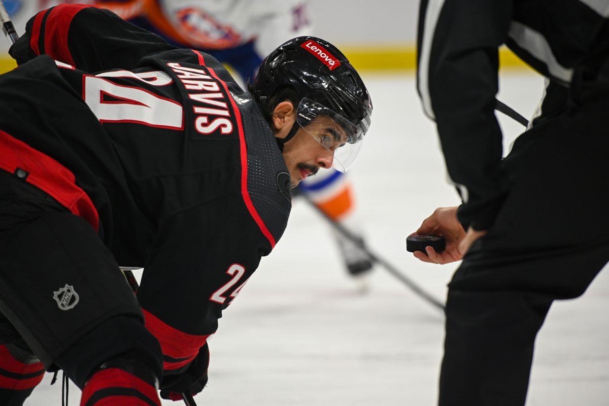 Carolina Hurricanes center Seth Jarvis watches the puck before a faceoff during the game against the New York Islanders in PNC Arena on Thursday, Nov. 30, 2023. The Islanders beat the Hurricanes 5-4 in overtime.