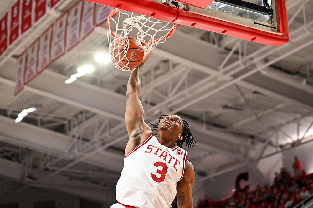 Sophomore guard MJ Rice dunks the ball during the annual Heritage Game against Maryland-Eastern Shore in Reynolds Coliseum on Wednesday, Dec. 6, 2023. Rice scored 11 points and made six rebounds. NC State beat&#160;UMES 93-61.