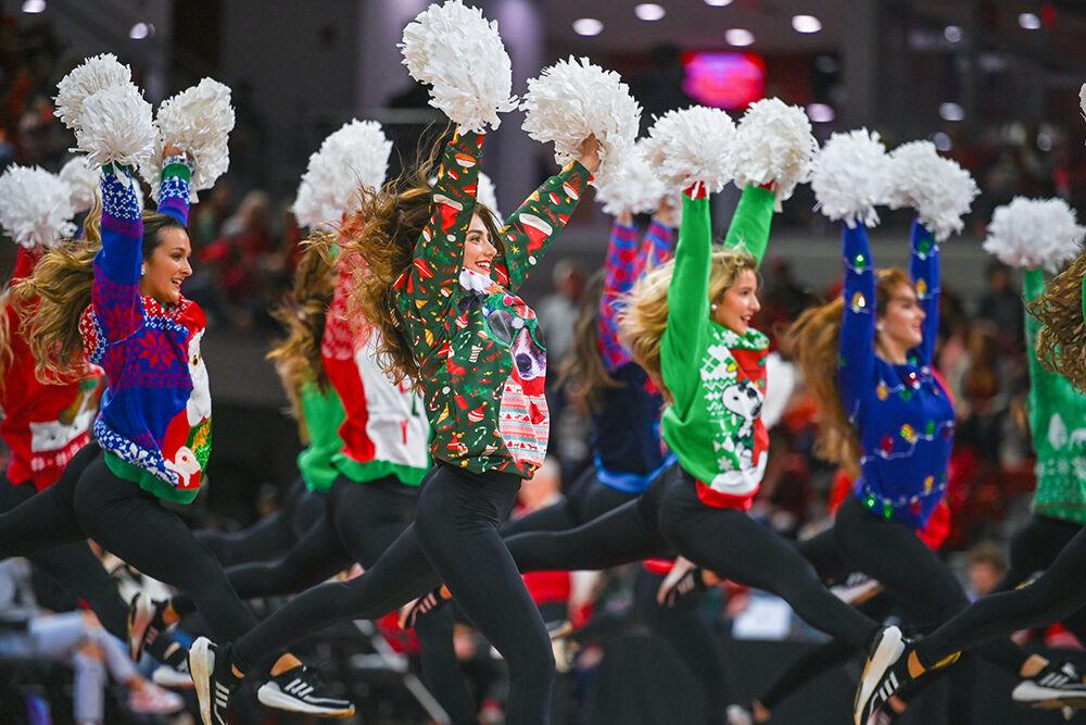 The NC State dance team performs during the game against Liberty at Reynolds Coliseum on Sunday, Dec. 10, 2023. NC State beat Liberty 80-67.