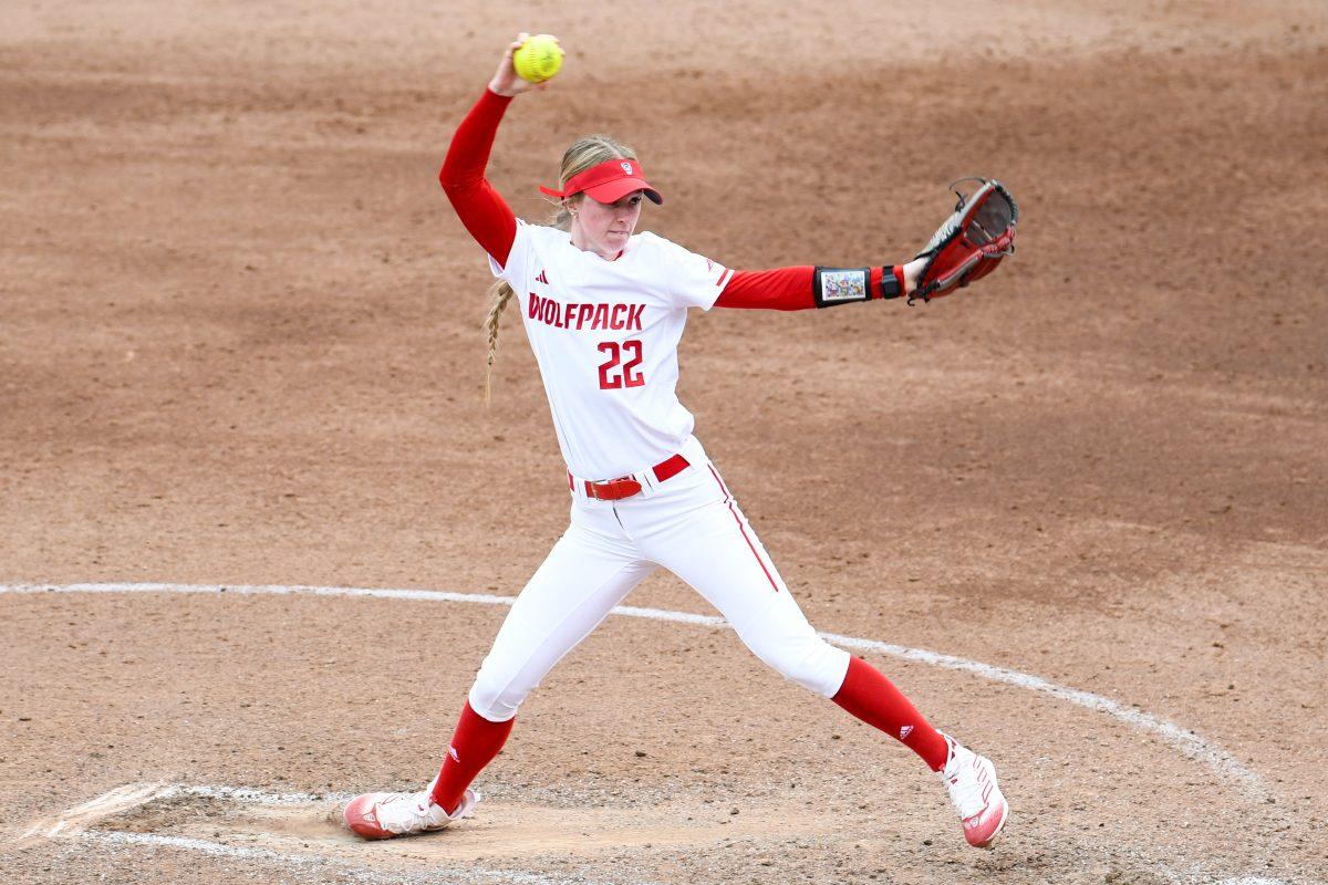 Sophomore pitcher Rylee Wyman hurls the ball in the game against North Dakota State at Dail Softball Stadium on Friday, Feb. 16, 2024. Wyman pitched for four innings and had two strikeouts. The Wolfpack beat the Bison 6-4.