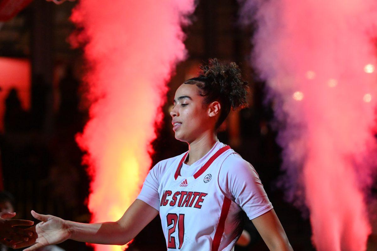 Senior guard Madison Hayes shakes hands with her teammate before the game against Syracuse in Reynolds Coliseum on Thursday, Feb. 29, 2024. Hayes scored nine points and made 10 rebounds. NC State beat Syracuse 75-71 in overtime.