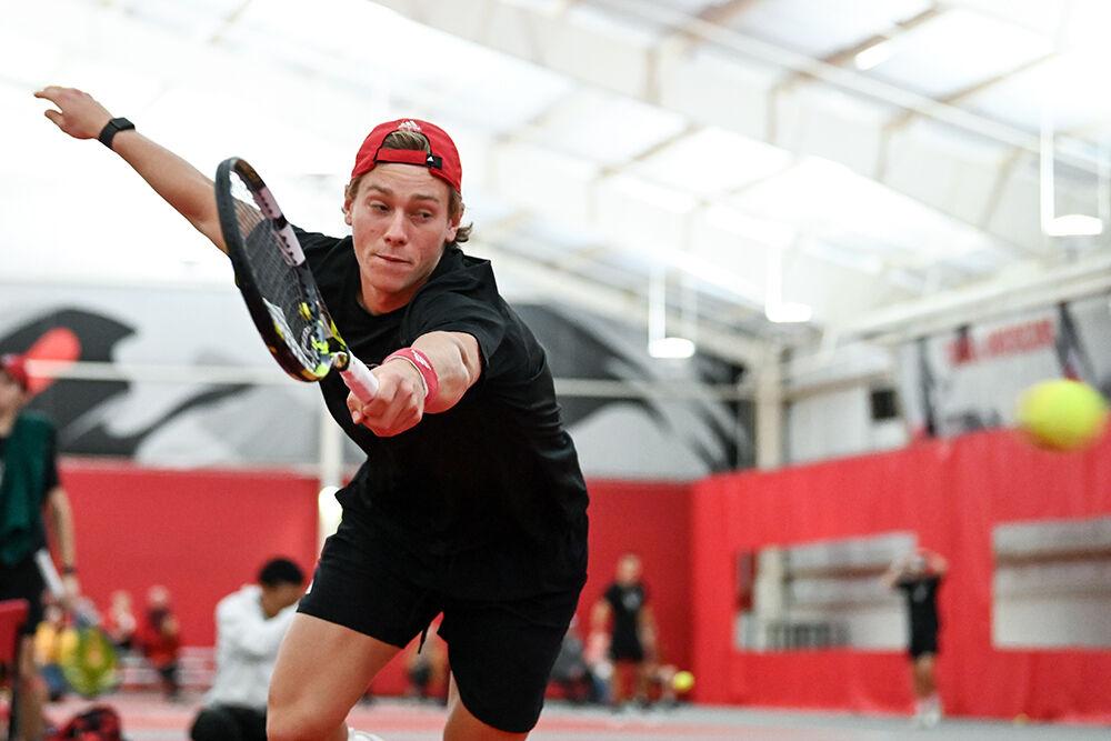 Junior Fons Van Sambeek watches as he misses the ball during the match against Columbia at J.W. Isenhour Tennis Center on Sunday, Feb. 4, 2024. Van Sambeek won his doubles match 6-2. NC State lost to Columbia 4-3.